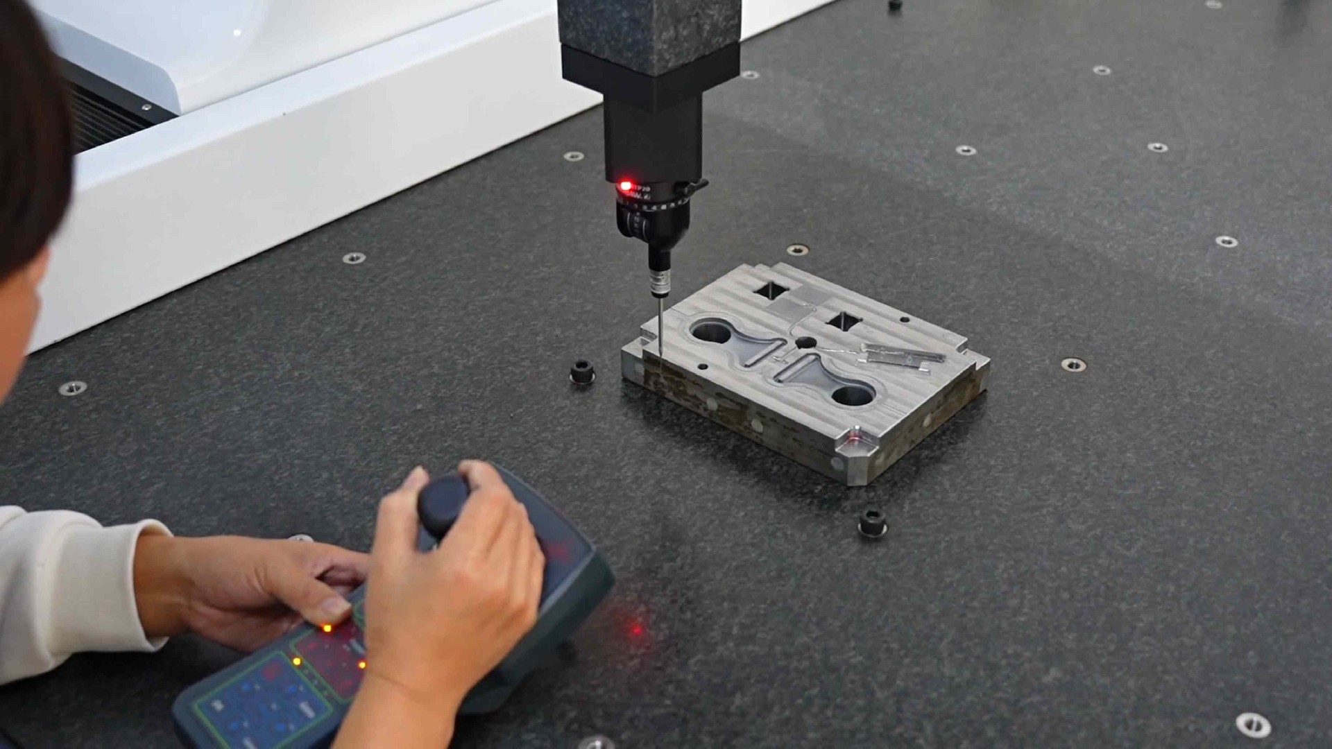 Precision measurement ensures consistent quality in molding.jpg
